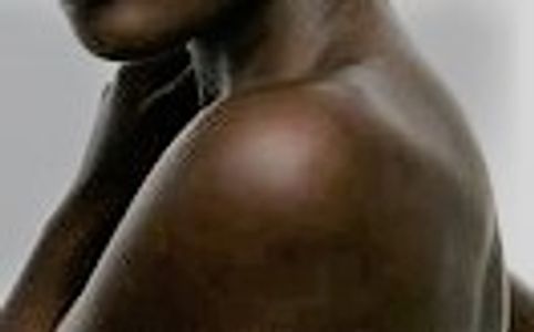 A close-up view of a person’s shoulder and neck