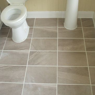 Tiled bathroom floor.