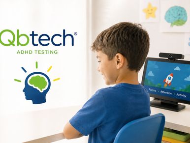 Young boy engaging with ADHD testing on a computer.