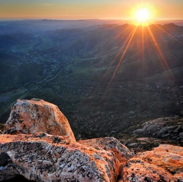 The sunsetting over a mountain in El Cajon, California. 