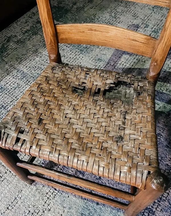 Image of broken wooden chair