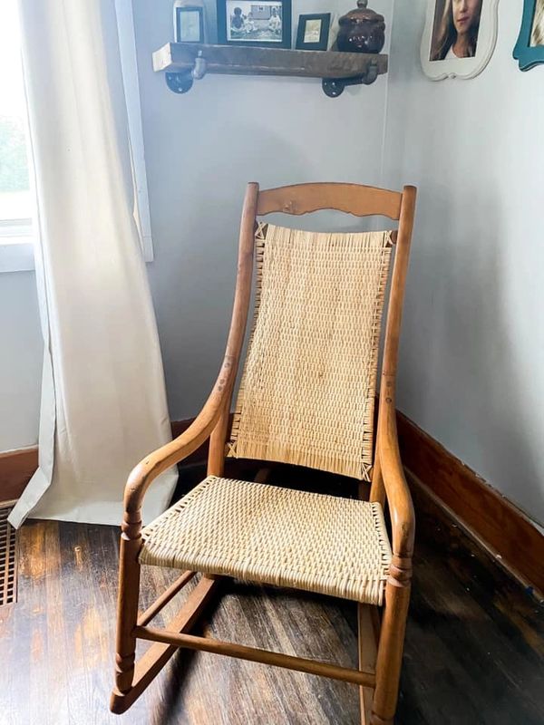 Restored wooden rocking chair with fresh caning on seat and the back of the chair.