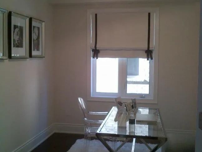 home office custom roman shade
fabric shade
art deco inspired roman shade
white and black home offic