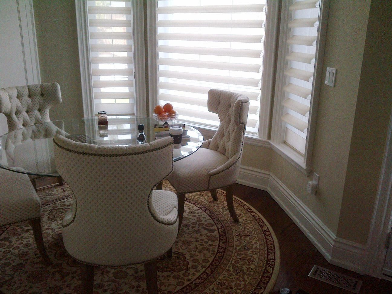 Hunter Douglas Pirouette shades
Living room shades
bay window shades