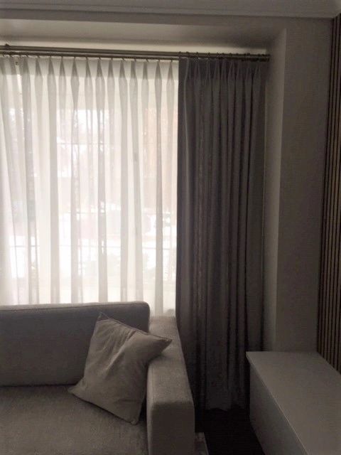 elegant living room drapery
two pleat heading drapery
custom drapery and sheers