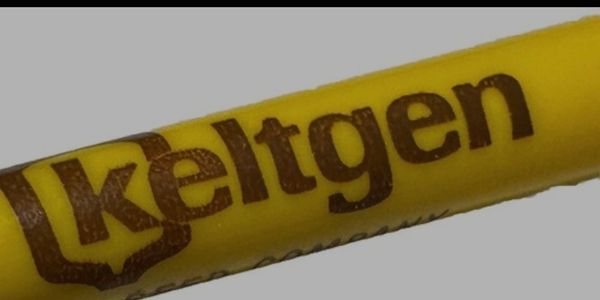 Close-up of a yellow object with the word 'Ikeltgen' printed on it.
