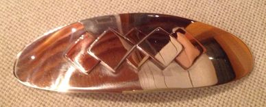 solid sterling silver hairclip with copper, gilding metal and silver accents