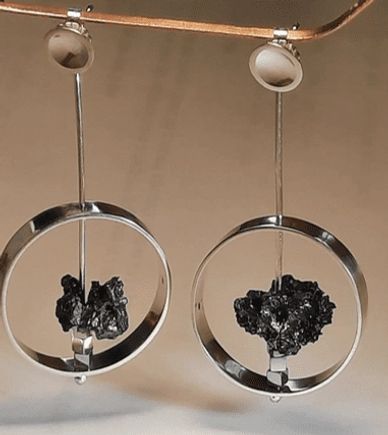 solid sterling silver earrings with silver circle and lava stone