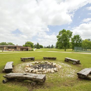 Outdoor fire pit at Fairway Inn & Suites