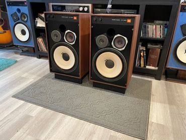 JBL 4311 Completely Restored Speakers. On Black Speaker Risers