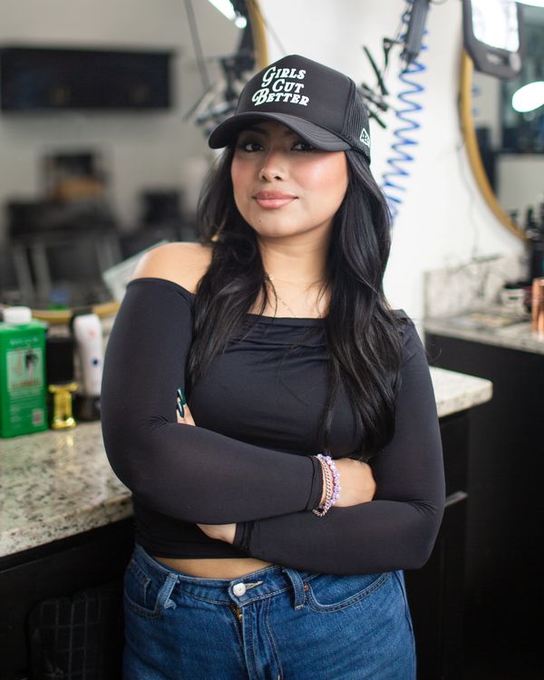 Esmeralda barber at 903CUTZ Tyler TX known for clean
cuts and soft blends.