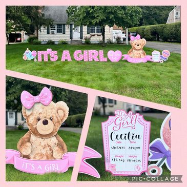 It's a Girl lawn announcement in pink letters with a giant cute teddy bear and keepsake sign.
