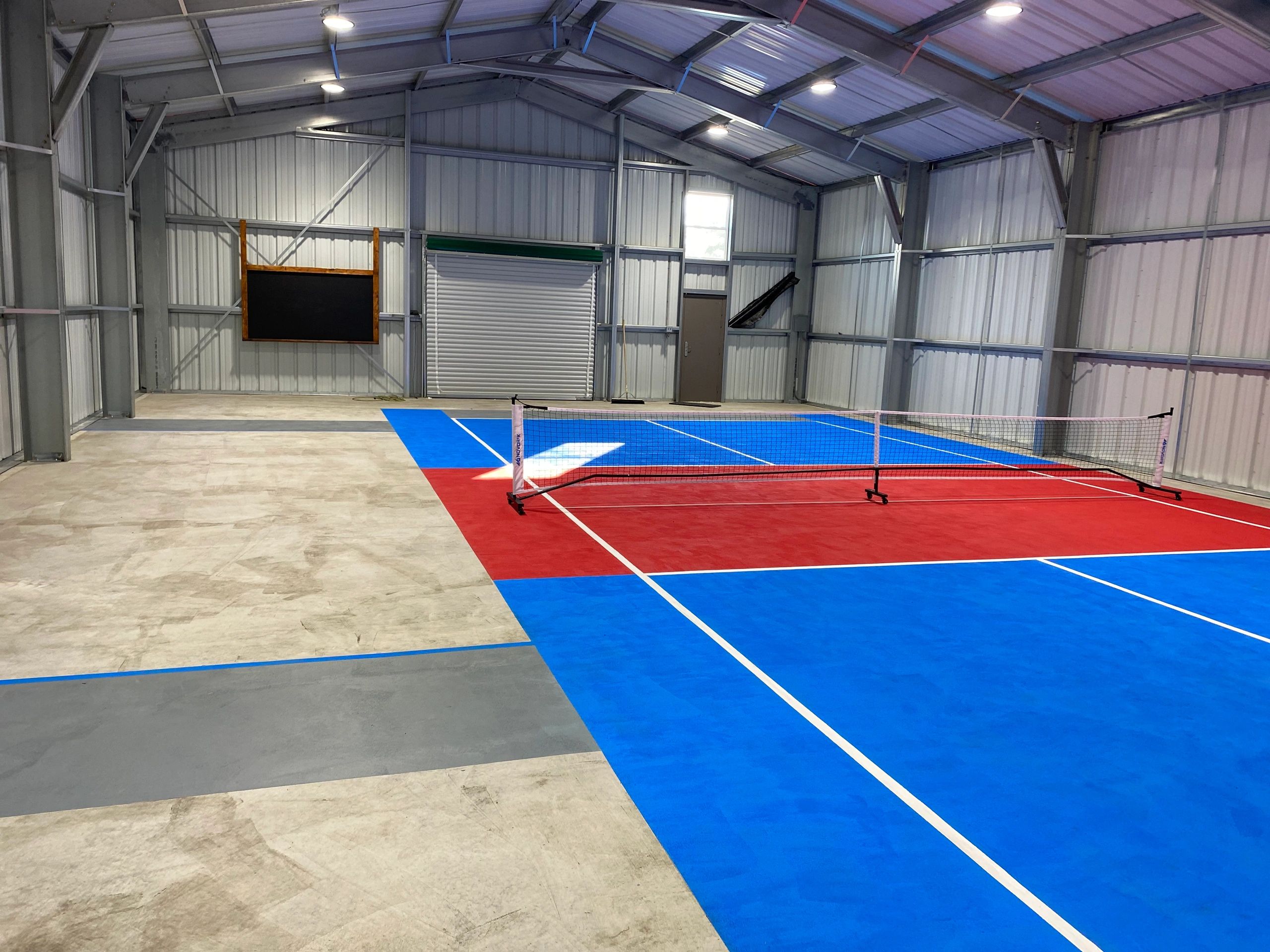 Room for a little cornhole while watching or waiting your turn on the pickleball court