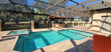 Mansard pool enclosures are popular for their elegant and practical protection.