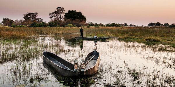 Mokoros at sunset, Okavango Delta Mobile Expedition, Botswana, Southern Africa