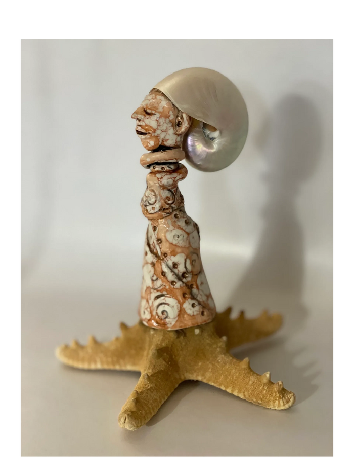 King Nautilus
Clay, ink, encaustic, shellac burn, starfish and nautilus shell
Approx 9" tall