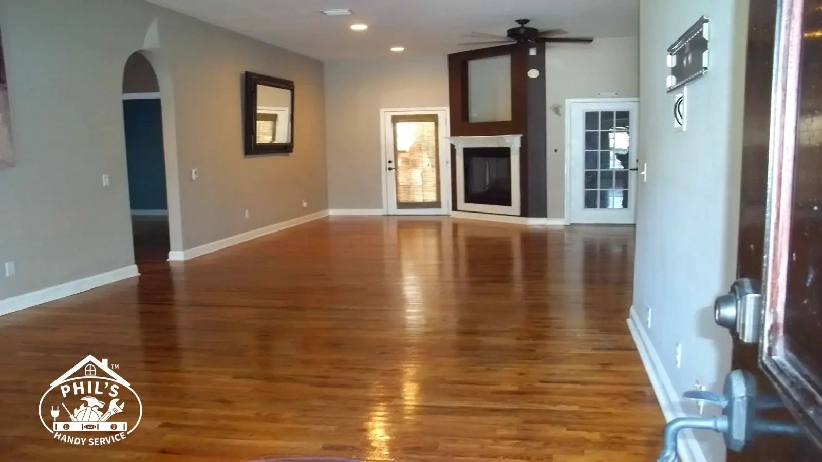 Kansas City home repair project featuring refinished hardwood floors and updated interior space
