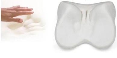 A hand pushing against the Arto Pillow - Memory Foam, showing the hand design still remaining.