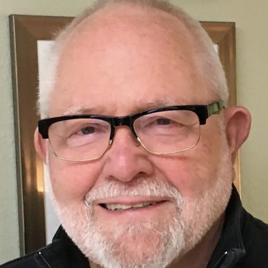 head shot of a man named Michael Petty