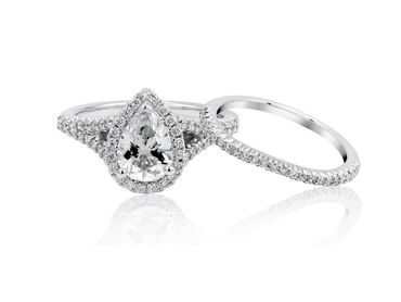 Platinum Pear Shape Halo Diamond Ring.