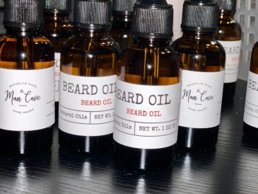 Bottles of beard oil and grooming products.