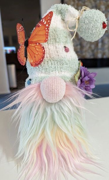 Gnome with butterfly - made with socks, rice and accoutrements.
