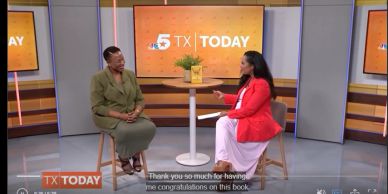 Two women in a TV studio discussing a book.