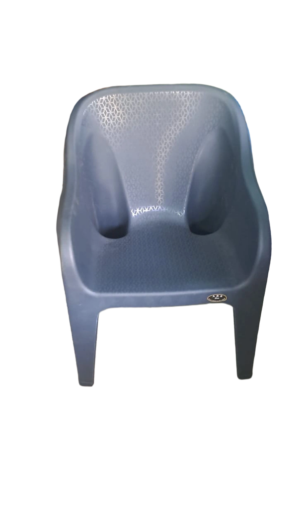 A gray plastic chair with a patterned backrest and sturdy legs.