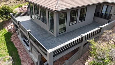 Luxury composite deck with covered patio built in Lone Tree, Colorado by Global Cooperation LLC