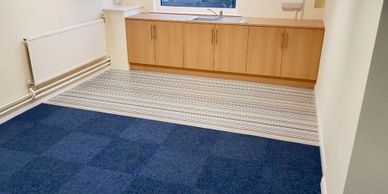 Vinyl and carpet tiles fitted to office space.