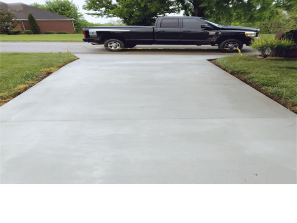 Concrete driveway that we poured, saw cut control lines, and sealed.