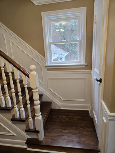 beautiful double pain windows with ledge and wainscoting