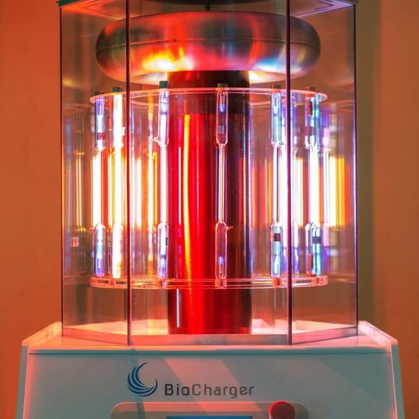 A brightly glowing BioCharger frequency machine, helping to heal energy imbalances in body and mind.