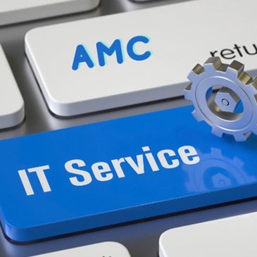 Keyboard with blue 'IT Service' key and two metallic gears, symbolizing tech support.