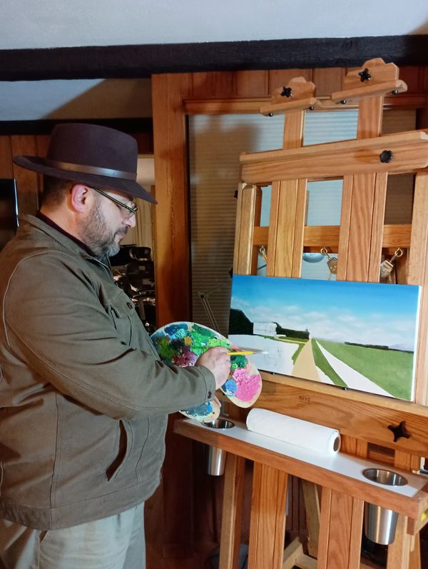 I do most of my painting on a desk but occasionally I use an easel.