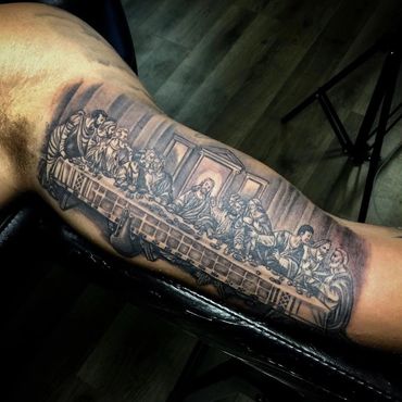 Last supper arm tattoo by T at Tattoo Kings