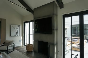 Micro-cement hand built fireplace.