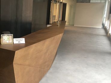 Microcement application with custom color.