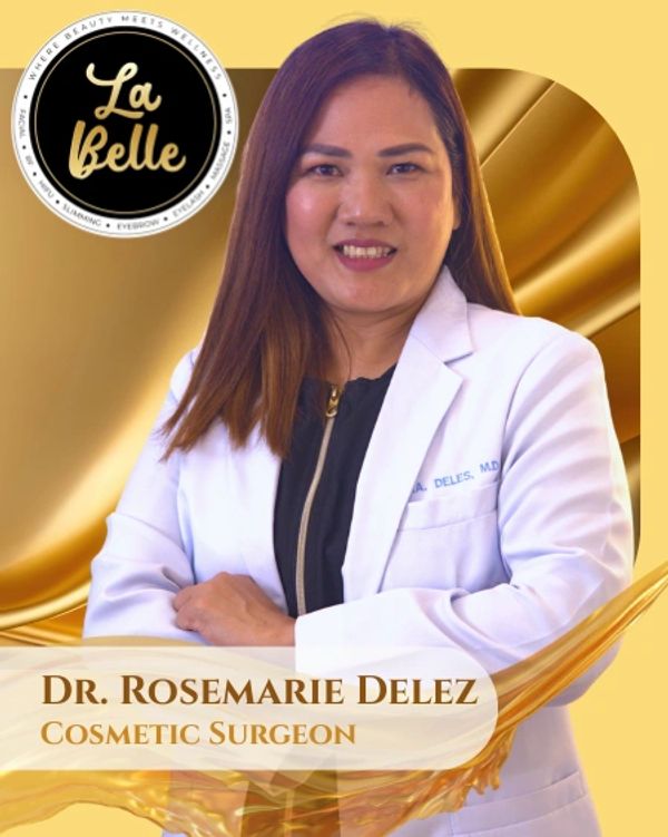 Dr. Rosemarie Delez, a cosmetic surgeon, poses confidently in a white coat with a golden background.