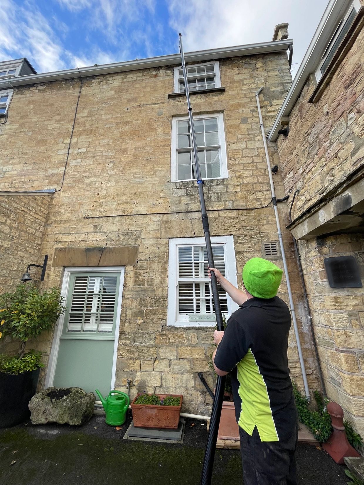 Gutter cleaning in Leeds carried out safely using a gutter vacuum system.