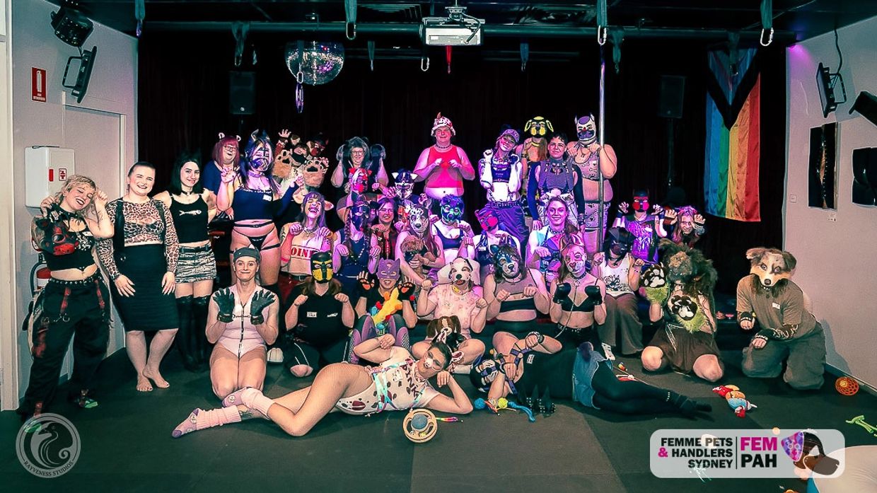 Group photo of people in animal-themed costumes at Femme Pets & Handlers Sydney event.