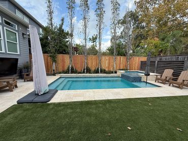 Custom cedar privacy fence installed around a River Oaks backyard in Houston