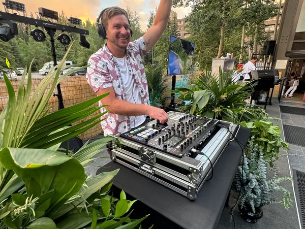 DJ Dave performing in Breckenridge with a Traktor S8 and GigBAR ILS at a luxury mountain event.