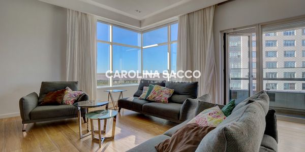 Living de departamento premium en Alvear Tower, Puerto Madero.
