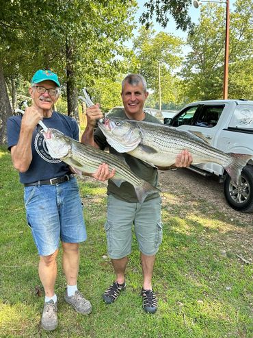 Loren Groff With his 31.7 lb striper pictured with his father-in-law Bill.