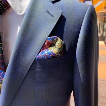 pocket square, windowpane suits, hand made buttonholes shorten sleeves 