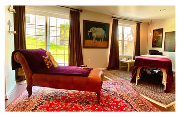 Reiki and Skin Treatment Space. Massage table with for treatments.