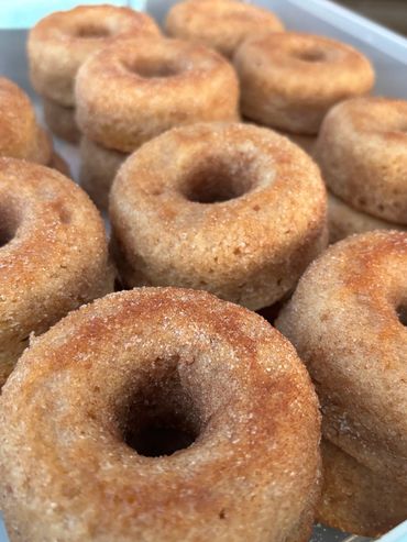 Freshly baked cinnamon sugar mini donuts.