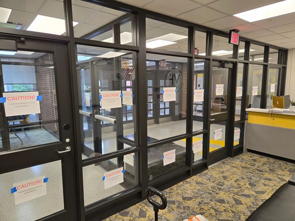 Window tinting services providing added  safety for schools and loved ones using 3M Security Film.