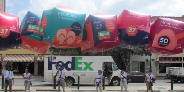 An example photo of aerial inflatable outdoor advertising from National Mobile Billboards, LLC